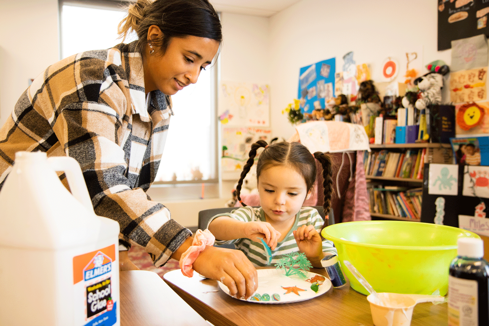 NJC Student working with child in Early Education Class