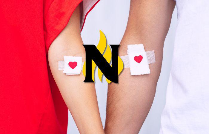 2 people holding hands with a heart band aid on with the NJC logo in the middle.