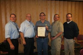 Harv Rober who directs the diesel technology training at NJC (center, holding plaque) has worked with the automotive program advisory committee in recent months to do the necessary work to get this program accredited for the first time by the National Automotive Technicians Education Foundation, which is a big deal for diesel training programs. Pictured here with Rober is some of the advisory committee members including (l to r) Wally Beardsley from RE1 Valley School district, Tim Richie from NAPA Auto and 