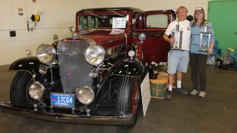 Deb and Ray Hardy of Yuma pose with their 1932 Cadillac LaSalle that captured the big prizes this year at the NJC Auto Show when it was selected as the 2015 People’s Choice entry as well as also being named Best Display winner. These prizes are determined by votes from the public and the various exhibitors participating in the show. 